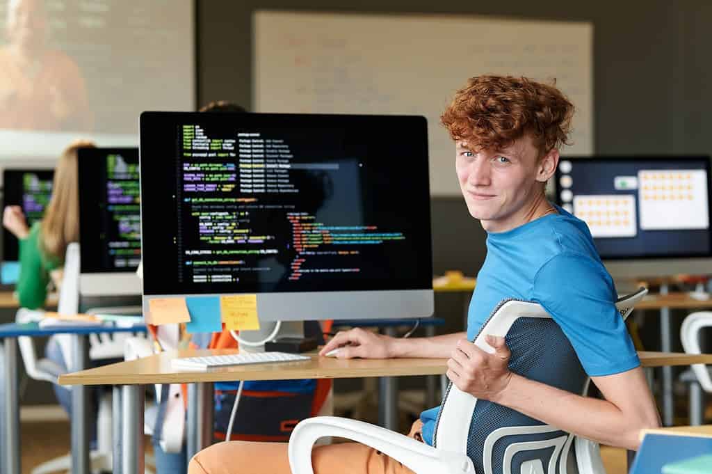 Student using computer at IT lesson